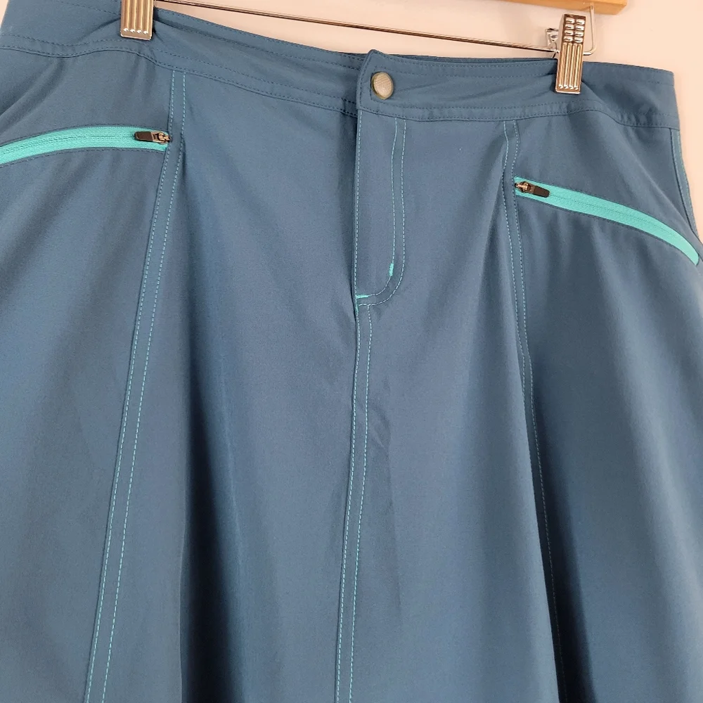 TITLE NINE Swingtastic teal Nimblene stretch UPF 50 athletic quick-dry skort